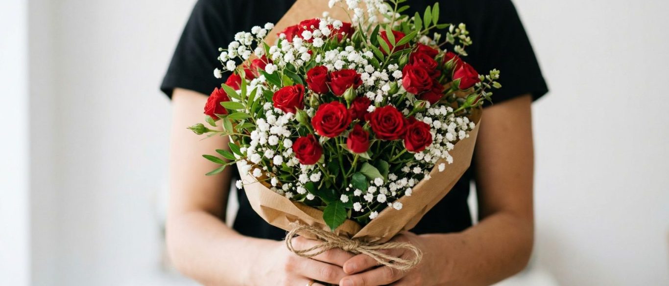 Ramo de lirios naranjas con hojas de helecho